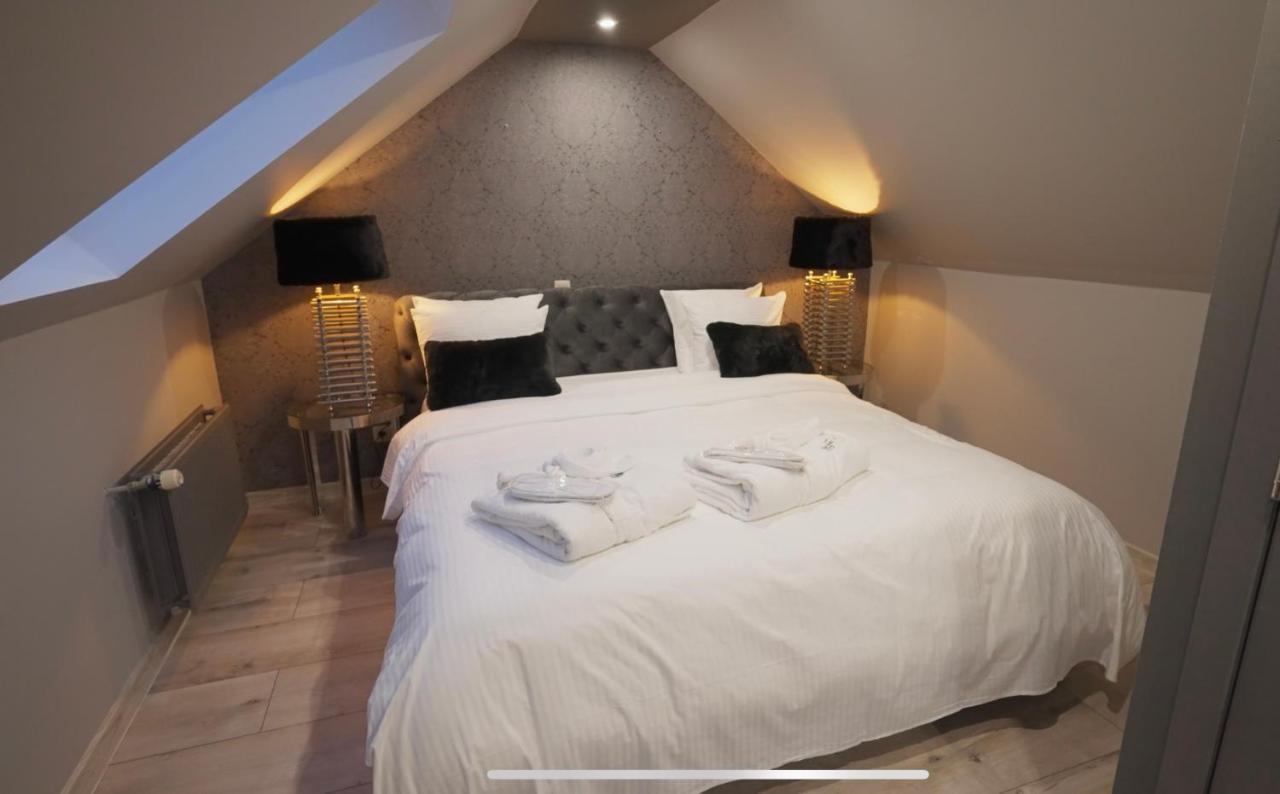Les Suites M Wanze Экстерьер фото