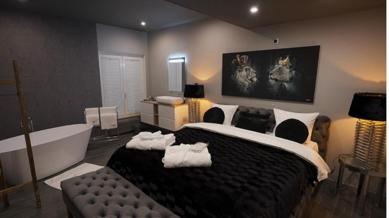 Les Suites M Wanze Экстерьер фото